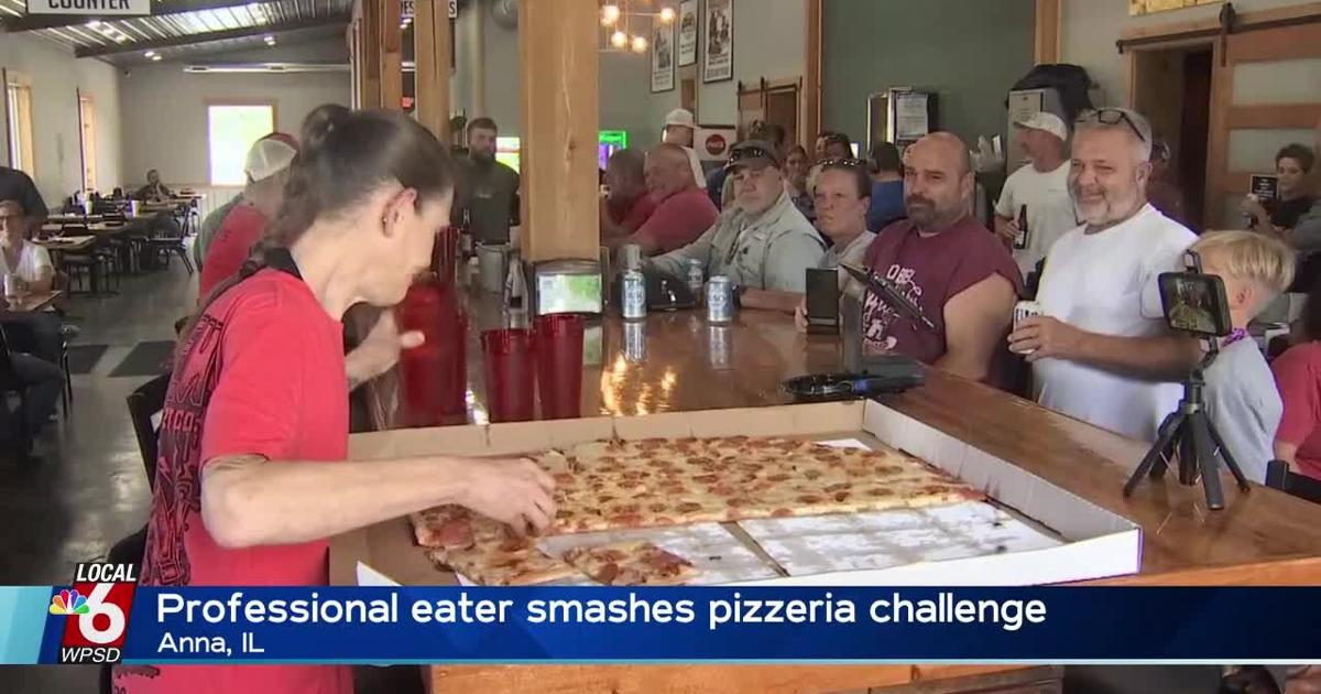 Professional eater smashes pizzeria challenge