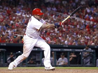 Yadier Molina shattered his bat while attempting to tap home plate