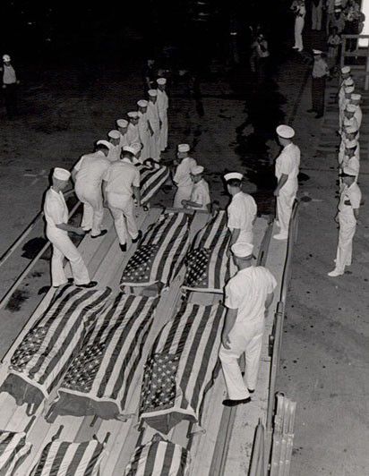 NAVY-2-SAILORS-FLAGS-OVER-CASKETS