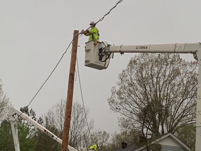Photos show downed trees, crews repairing power lines after Wednesday's ...