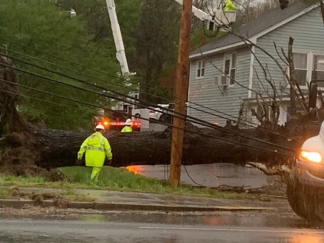 Photos show downed trees, crews repairing power lines after Wednesday's ...