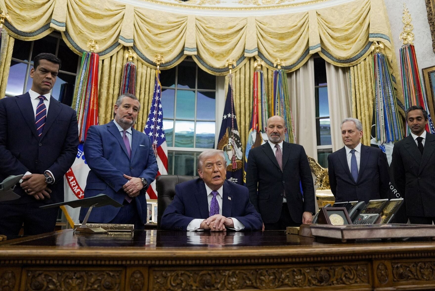 Trump signs executive order blocking states from enforcing their own ...