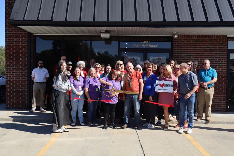 Feline fans, local business leaders gather for ribbon cutting at