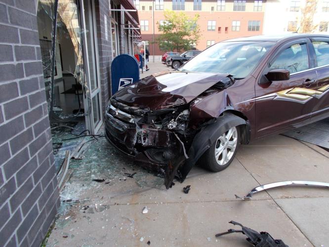 No injuries reported after car crashes into Eau Claire post office Archive
