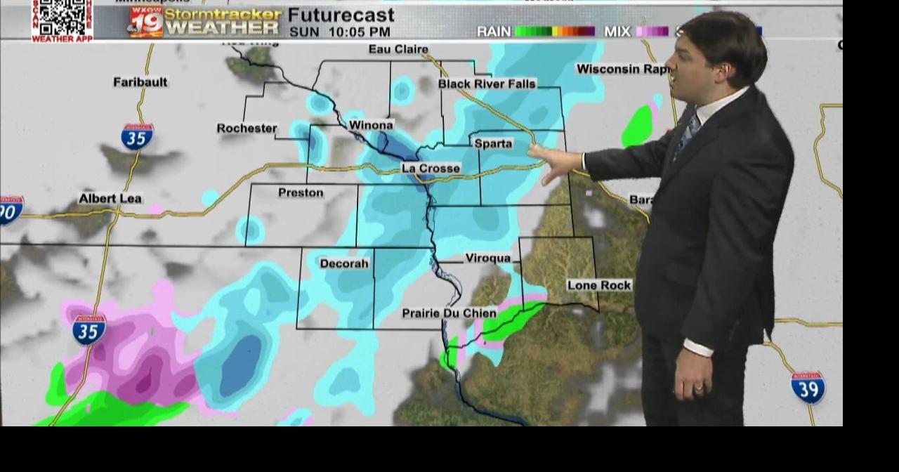 Blustery winds reducing visibility with light snow showers mainly ...