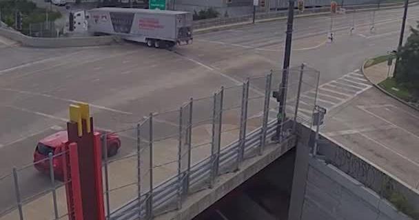 Watch: Out-Of-Control Semi Truck Dangles Over Cincinnati Interstate