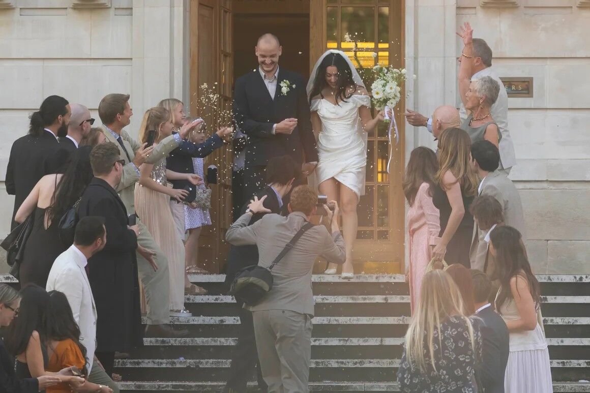 charli xcx wedding dress Charli XCX wears a custom Danielle Frankel wedding gown to celebrate her marriage to George Daniel on September 13, 2025, in Sicily, Italy. The custom gown features a bias-cut ivory silk chiffon