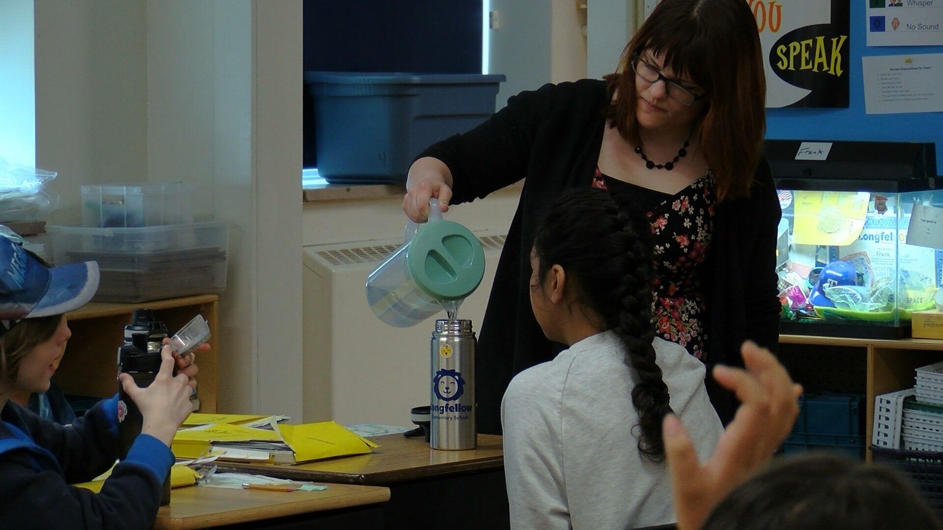 UWEC students teach elementary students importance of drinking water