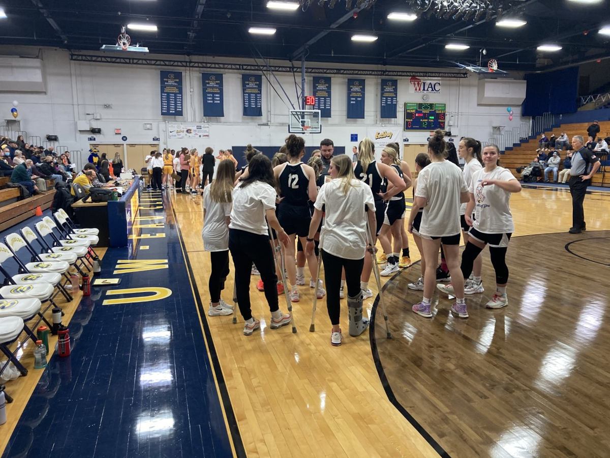 Blugolds raise $ for cancer, rally past Falcons