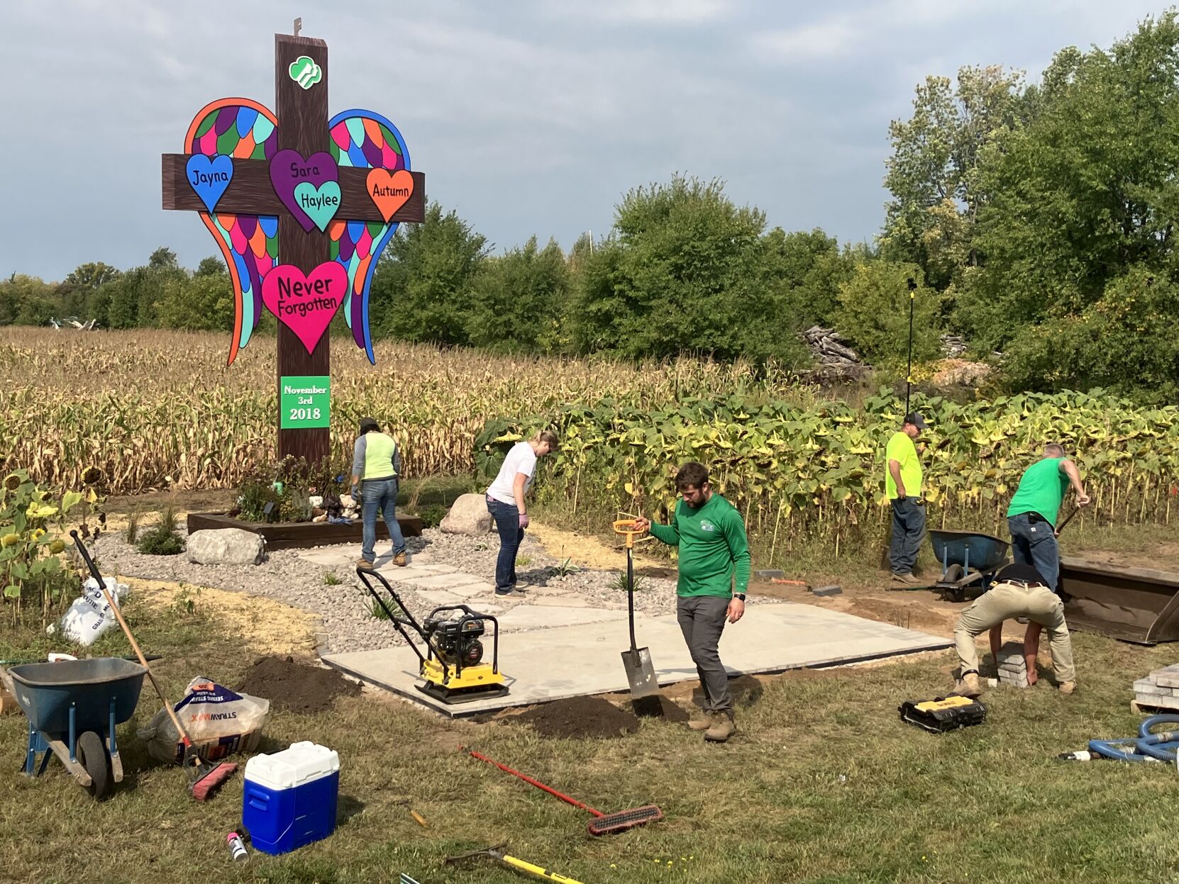 Volunteers expand memorial for Girl Scout Troop 3055 Top Stories