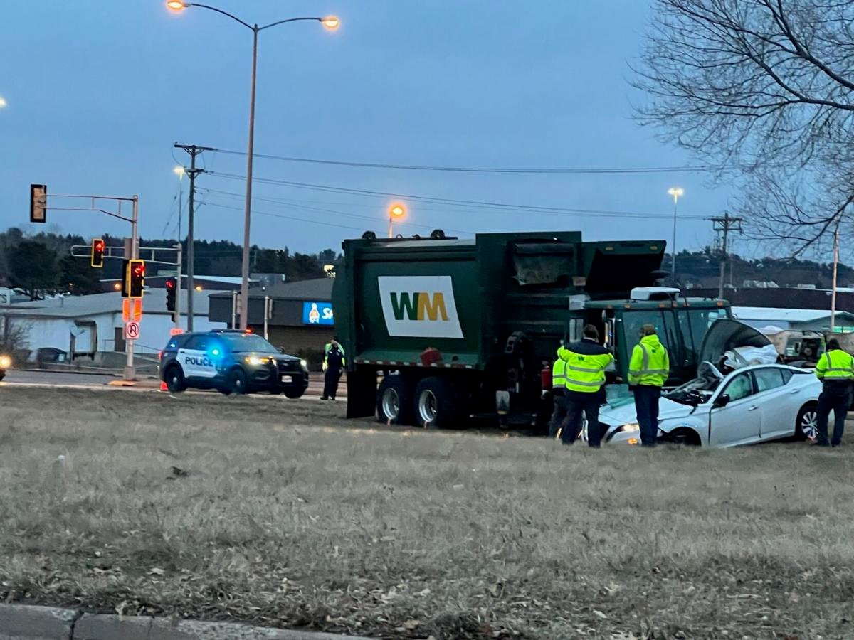 Two injured after car crashes into garbage truck on Hwy 93 in Eau