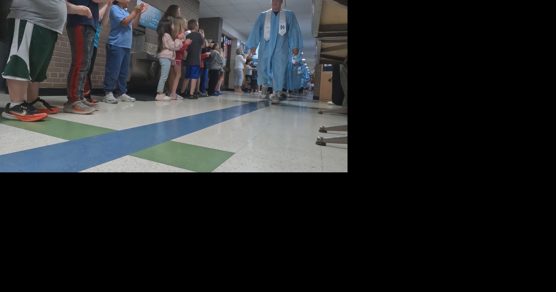 North High School seniors walk halls and visit kids at Locust Lane before graduating