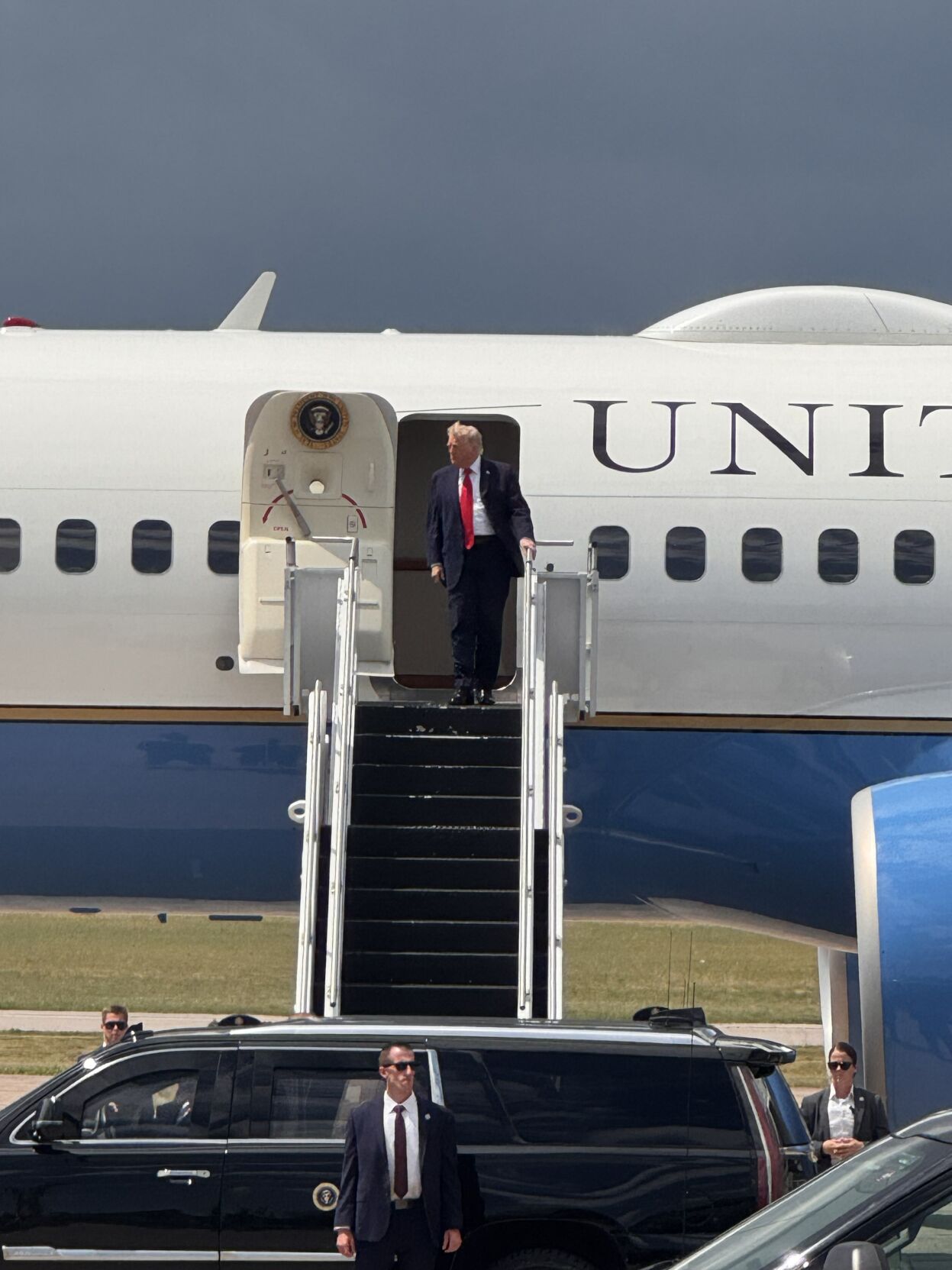 President Donald Trump waves to the crowd in Chippewa County