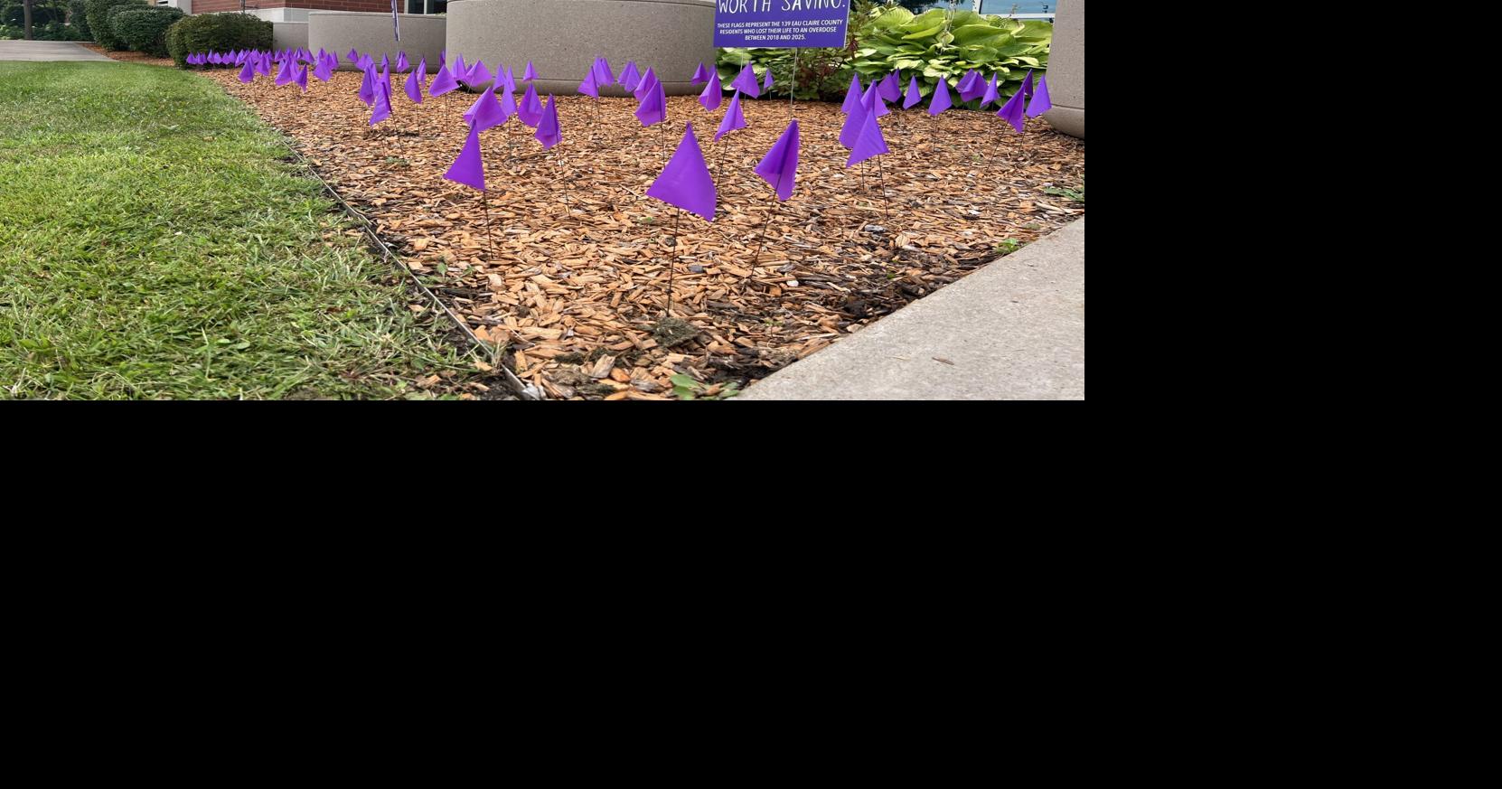 Eau Claire City-County Health Department plants flags in honor of Overdose Awareness Day