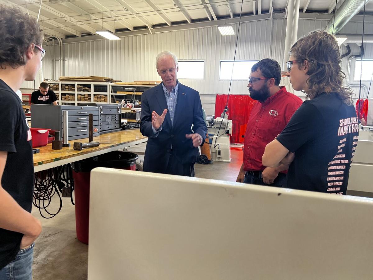 Senator Ron Johnson tours studentled business at ElevaStrum High