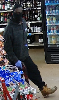 DSP Releases Suspect Photos in East Coast Liquors Robbery