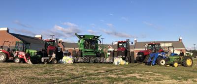 Woodbridge students drive tractors to school to celebrate National Agriculture Day