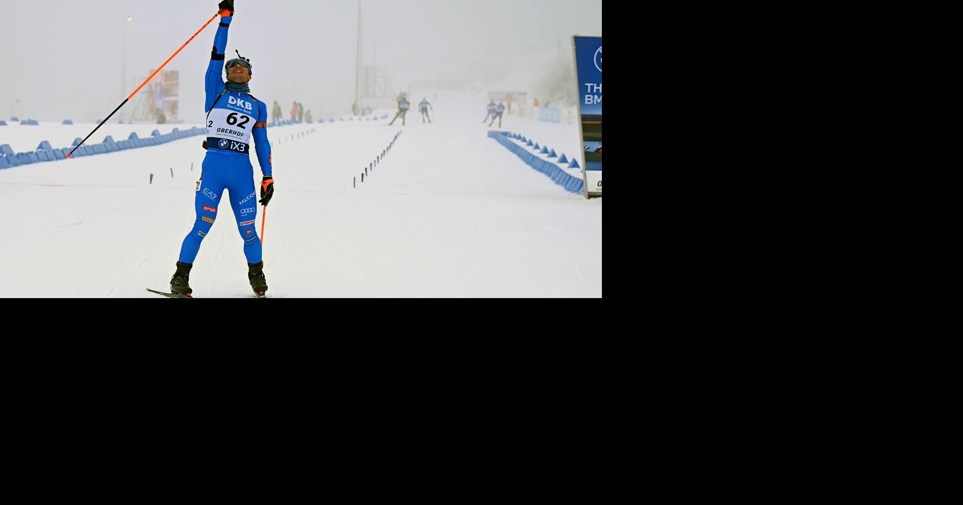 Italy's Tommaso Giacomel honors late Norwegian biathlete in World Cup sprint win