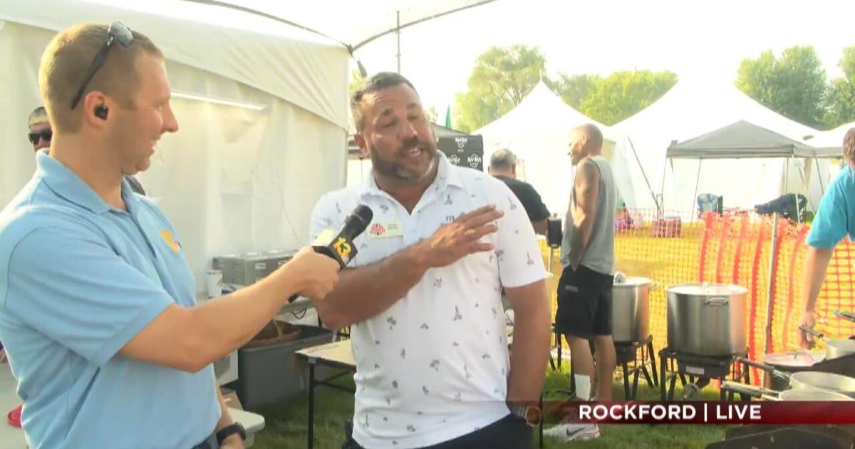 13 WREX's Derek Bayne checks out the pasta tent at Festa Italiana