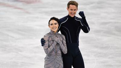 Madison Chock and Evan Bates celebrate after the Team Event