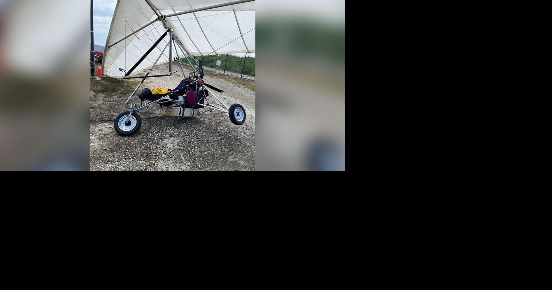 Cuban migrants fly into Key West airport on motorized hang glider