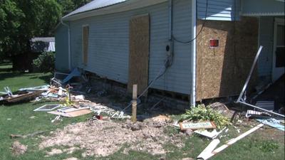 McLeansboro family picking up after truck crashes into their home