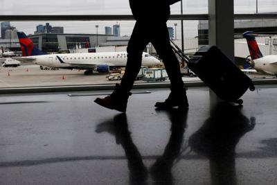 Thousands of flights are delayed after severe storms disrupt air travel