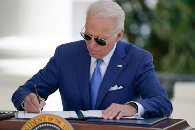 Biden signs bills tackling Covid relief fraud into law