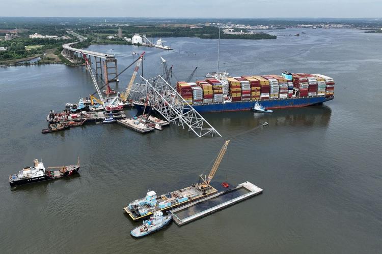 Demolition charges set off to free cargo ship from the wreckage of Baltimore bridge after weekend weather delays