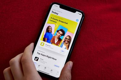 Snap shares plunge 30% in the wake of quarterly loss, layoffs