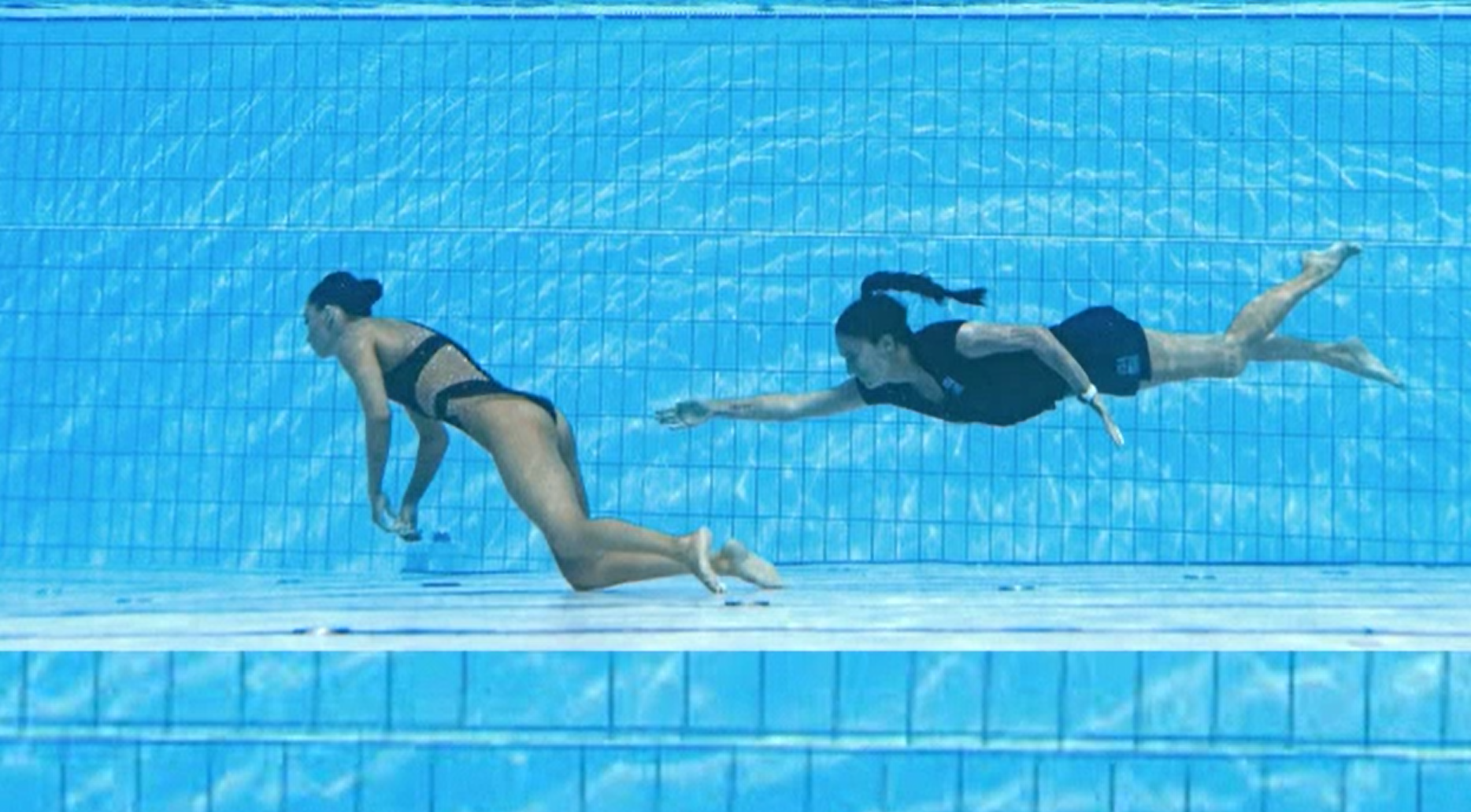 Coach dives into pool to rescue American swimmer Anita Alvarez at World Championships News wsiltv