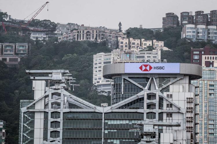 HSBC's top execs face tense shareholders calling for a breakup