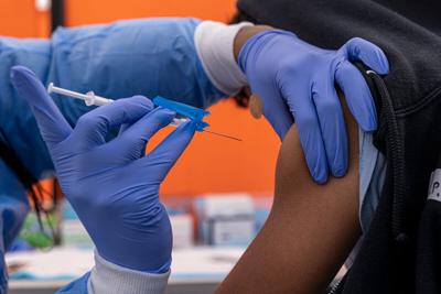 A 4th dose of Covid-19 vaccine will be needed, Pfizer's CEO says, but the company is working on a shot to handle all variants