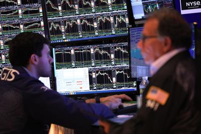 Dow tumbles on red-hot US job market