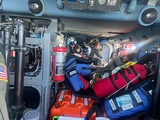 Boaters who went missing on a fishing trip were rescued by the US Coast Guard as they fended off shark attacks