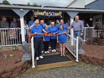 Kampers Supply ribbon cutting