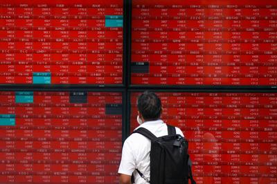 Japanese stocks rebound from worst crash since 1987 while global markets are mixed