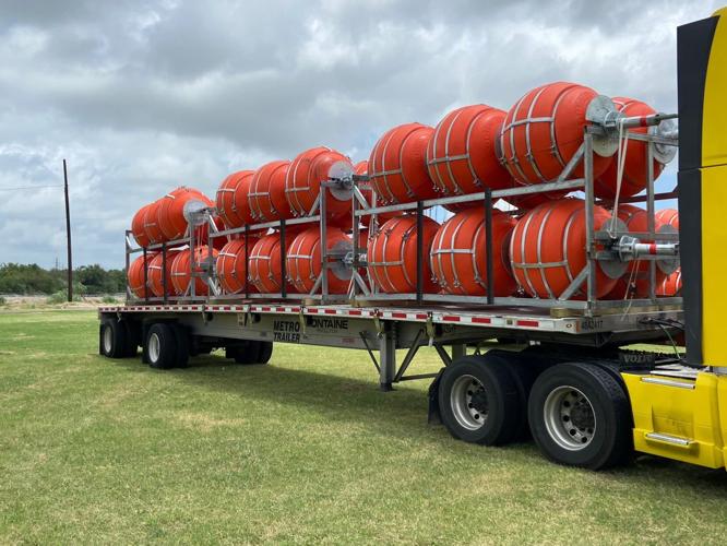 Texas sued over plan to deploy floating barrier on Rio Grande to curb border crossings