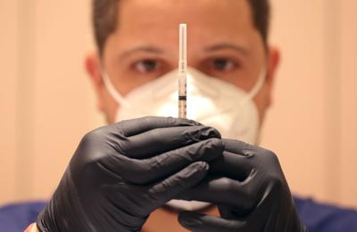 US officials working on a plan to allow second Covid-19 boosters for all adults