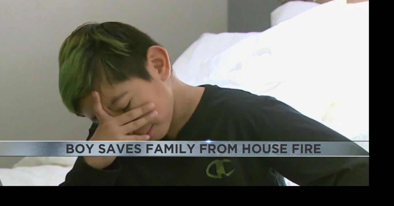 Boy saves family from house fire Video