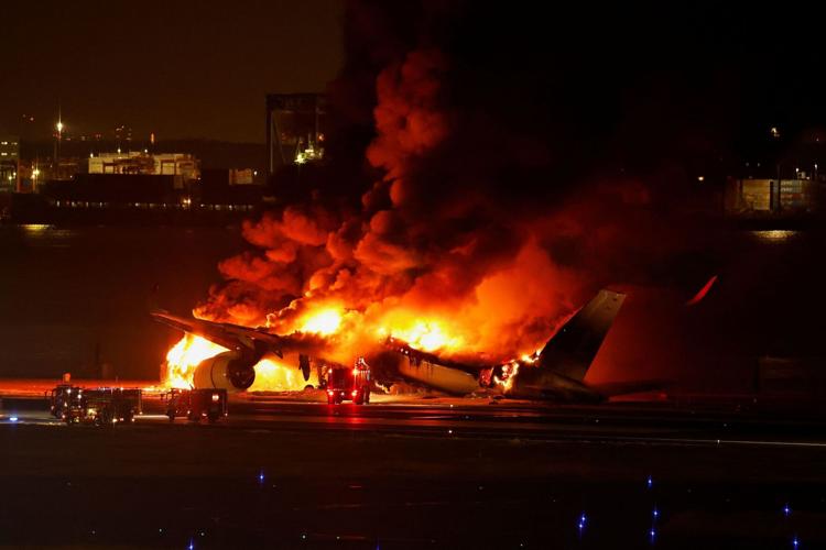 Japan coast guard plane not cleared for takeoff before deadly runway crash, air traffic control transcript suggests