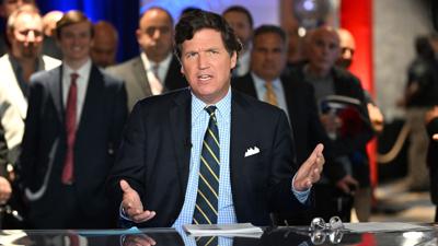 Justice Department opens criminal hacking probe into leaked Tucker Carlson videos