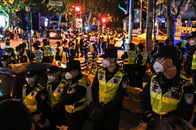 Protests erupt across China in unprecedented challenge to Xi Jinping's zero-Covid policy