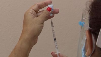 Needle filled with COVID vaccine