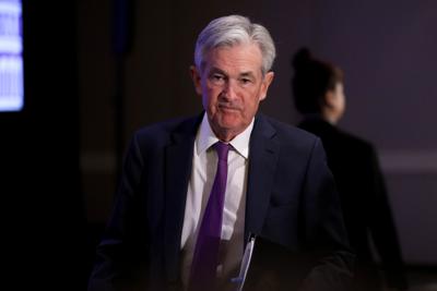 The Fed lifts rates by half a point, acknowledging that inflation is easing