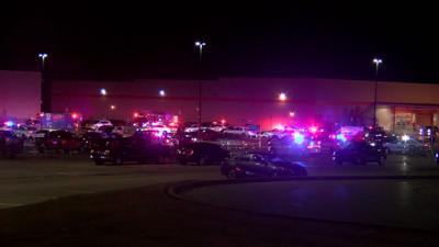 Numerous officers at the scene of an active shooting incident at the Walmart store on the west side of Evansville, Indiana
