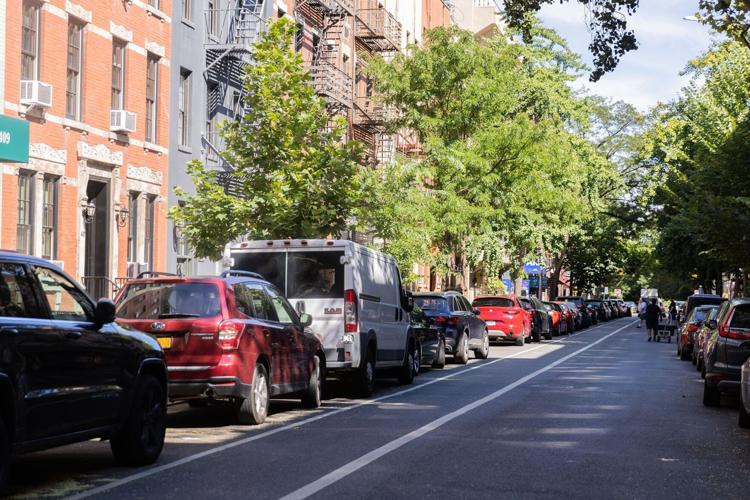 This little-known rule shapes parking in America. Cities are reversing it