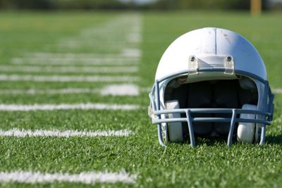 Experts in concussion, NFL leaders gather to identify gaps in knowledge, offer guidelines on preventing brain injuries