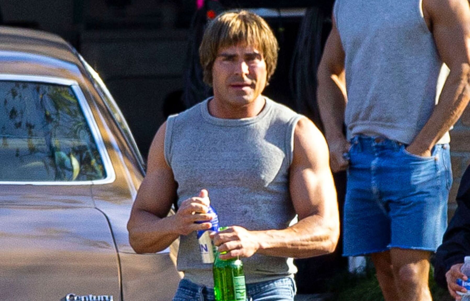 Zac Efron looks unrecognizable as a wrestler on the set of ‘The Iron Claw’