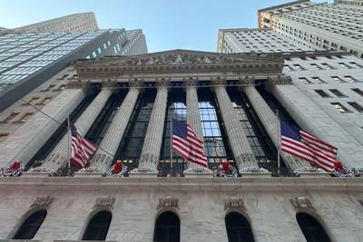 Wall Street soars on record bank profits and cooling inflation